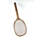 A vintage Model D tennis racquet, 69cms long.