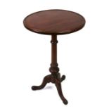 A George III mahogany tripod table with turned column on triform base with pad feet, 46cms