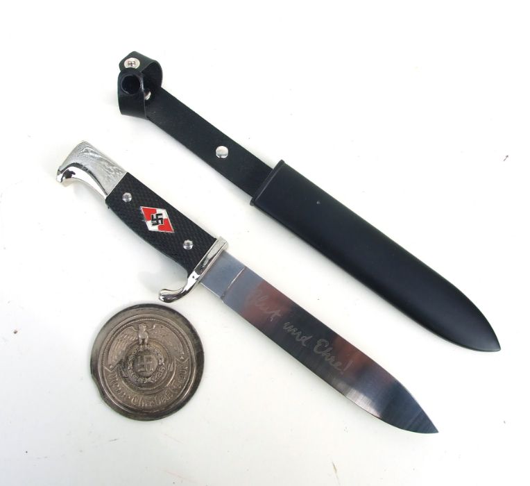 A reproduction Nazi Hitler Youth dagger with inscription Blut und Ehre together with an SS belt