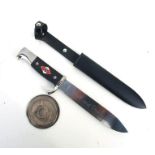 A reproduction Nazi Hitler Youth dagger with inscription Blut und Ehre together with an SS belt
