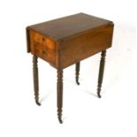 A 19th century mahogany drop-flap work table with two drawers and a well, on ring turned legs, 56cms