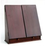 A mahogany desk top stationery box with fitted interior, 38cms wide.