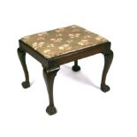 A mahogany stool with drop-in upholstered seat, on cabriole legs terminating in ball & claw feet,