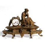 A 19th century French gilt metal figural mantle clock, 50cms wide.