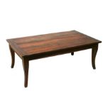 A stained pine coffee table, 120cm wide.
