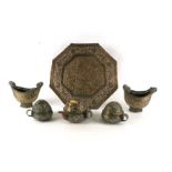 A group of Tibetan brass items to include an octagonal tray, a three-piece tease and a pair of