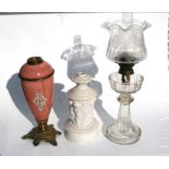 A Victorian cut glass oil lamp, overall 65cms high; together with a Parian style oil lamp base and a