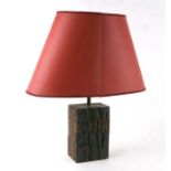 An unusual table lamp made from printers blocks, numbers and letters, 30cms high.