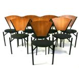 A set of eight 20th century Italian design chairs with fan shaped plywood backs ad upholstered