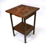 An Arts & Crafts style inlaid two-tier occasional table, 53cms wide.Condition Reporttired condition,