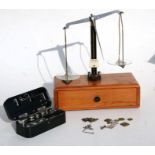 A set of W A Webb Ltd Class B Opium / Scientific scales, mounted on a mahogany box base with