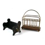An Edwardian brass and oak two-division magazine rack, 36cms wide; together with a chinoiserie