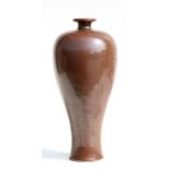 A Chinese brown glazed Meiping vase with incised mark to the underside, 30cms high.