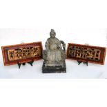 A pair of Chinese giltwood figural panels mounted in faux bamboo frames, overall 43 by 19cms;
