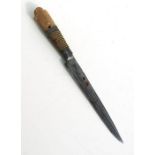 A 19th century Moroccan dagger with Rhino horn handle, having a single edged blade 15cms (6ins)
