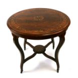 A late 19th century inlaid rosewood centre table, 76cms diameter.