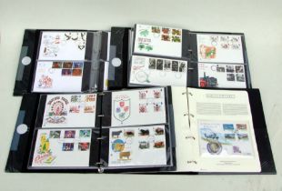 A quantity of First Day covers from the 80's, 90's and 2000's, some signed, in four albums (4).