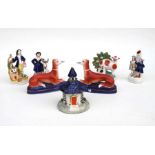 A group of Staffordshire and Staffordshire style figures; together with a similar pastille burner (