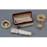 A 19th century Japanese ivory cane handle in the form of an octopus, 10.5cms high; together with a
