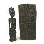 A large carved wooden group of a Nigerian lady carrying a baby with another child on her back, 95cms