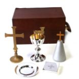 A leather cased military issue silver plated communion set.