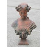 A terracotta bust of a lady in classical form, 45cms high.