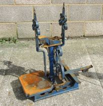 A set of blue painted wrought iron sack scales, 71cms high.