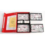 A modern cased Mah Jong set.