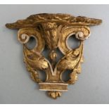 An 18th / 19th century English carved giltwood wall sconce, 19cms high.