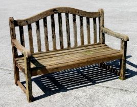A hardwood slatted garden bench, reduced in height, 120cms wide.