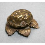 A Victorian novelty W Avery & Son gilt metal needle case in the form of a walnut on a leaf,