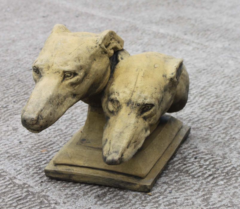 A reconstituted stone garden statue in the form of a pair of greyhound heads, approx 46cms long. - Image 2 of 2