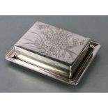 A Japanese silver box on stand decorated with chrysanthemums with three character signature to the