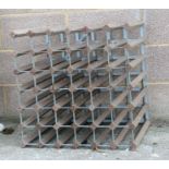 A thirty six division wine rack, 62cms wide.