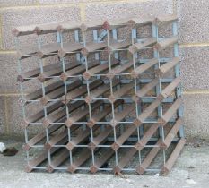 A thirty six division wine rack, 62cms wide.