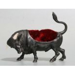 A late 19th / early 20th century Austrian cold painted bronze pen nib wipe modelled as a bull, in