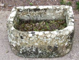 A well weathered carved stone cistern / trough, 43 by 49cms.