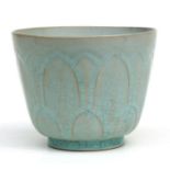 A Chinese celadon glaze lotus flower planter, 12cms high.