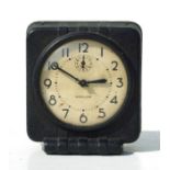 A WWII USA Waralarm clock, the paper dial with Arabic numerals, subsidiary seconds dial, 13cms