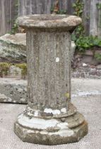 A reconstituted stone garden column, 69cms high. (a/f)