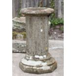 A reconstituted stone garden column, 69cms high. (a/f)