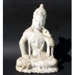 A large impressive Chinese white marble figure depicting a seated Guanyin, 57cms high.Condition