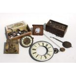 A quantity of clock and watchmaker's items to include dials, movements and a large quantity of clock