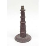 An Indian carved hardwood table lamp, 33cms high.