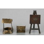 A W Avery novelty needle case in he form of an artist's easel, 12cms high; together with another