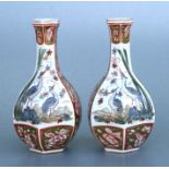 A pair of Samson vases in the Chinese taste, of hexagonal form, 20cms high (2).