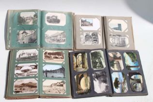 A large collection of antique and later postcards including real photographic postcards.