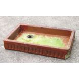 An Edwardian salt glazed pottery shallow sink, 76cms wide.