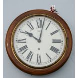 A Smiths Enfield school type wall clock, the white dial with Roman numerals, in a walnut case,