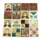A quantity of Art Nouveau and later tiles, together with a Barbola mirror